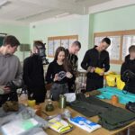 головна